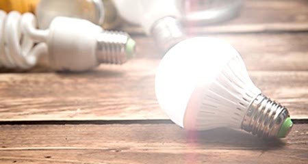 Light bulbs on a wooden table